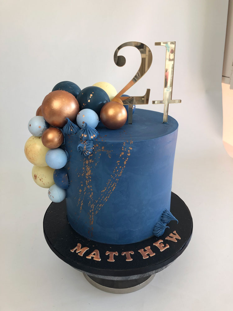 Blue and Gold buttercream cake
